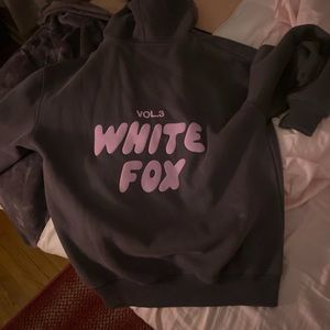 White fox hoodie, size S/M. Still has the tag on it. To small for me.
